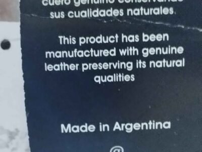 Cartera para dama ,confeccionada en cuero. Sin uso .