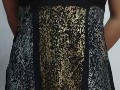 Vestido talle 2 ,negro con detalles plateados y dorados .